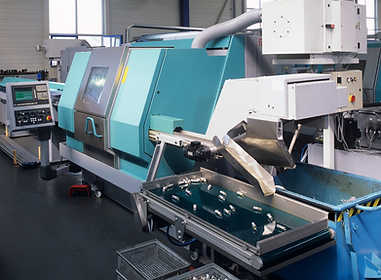 CNC machine in a factory setting