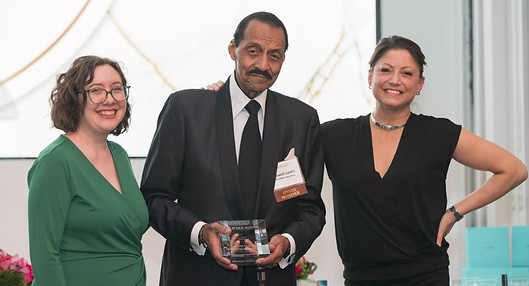 IFMA award 2023 LL with award.JPG