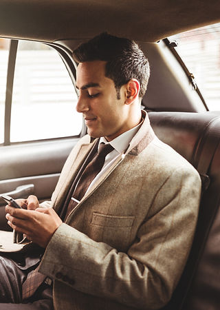 Businessman%20in%20a%20Car_edited.jpg