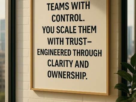 Office wall art with quote: “You don’t scale teams with control. You scale them with trust—engineered through clarity and ownership.” Symbolizes trust-based leadership in a modern workplace.
