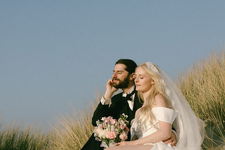 Romantic elopement at the sea in the dunes