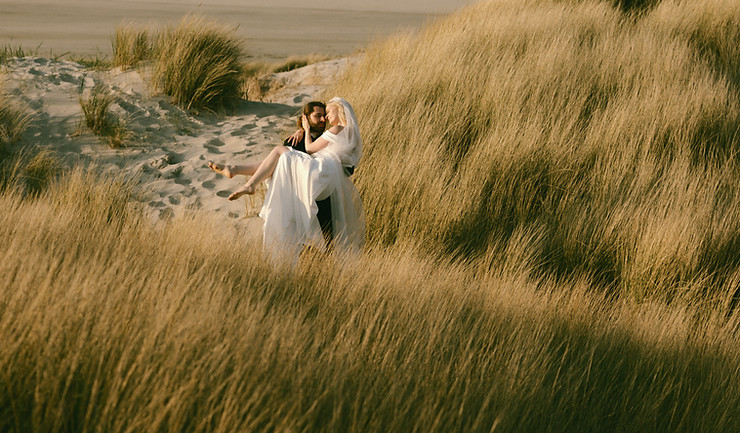 Romantic elopement at the sea in the dunes