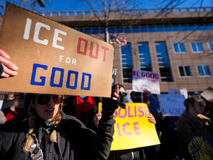 Demonstrators chant during a protest