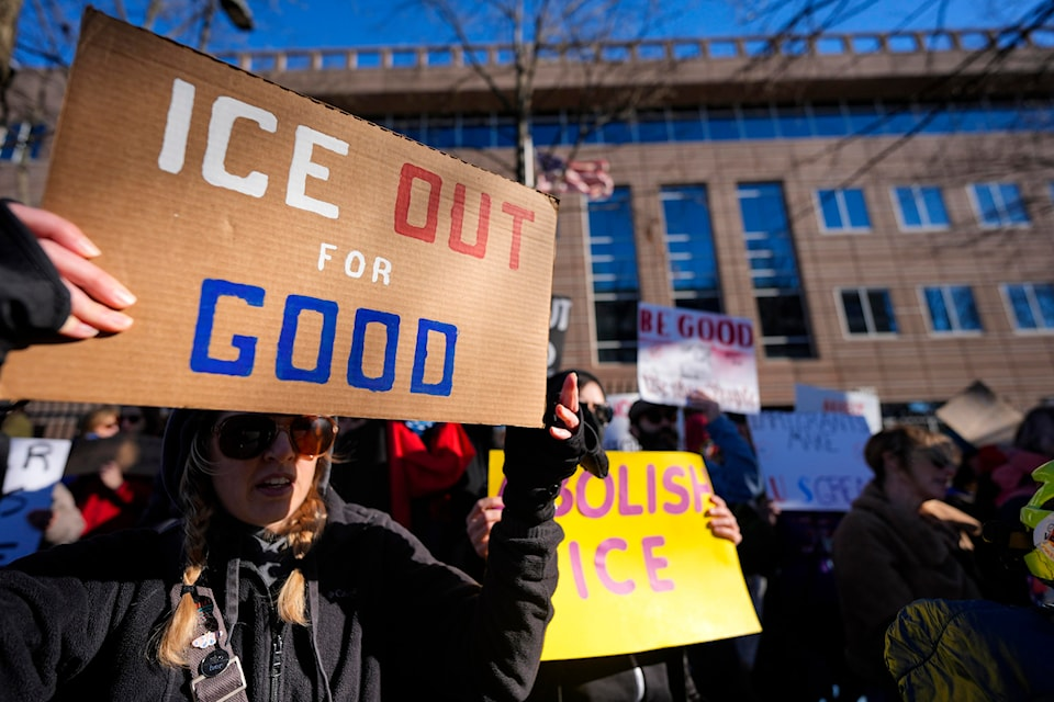 Demonstrators chant during a protest