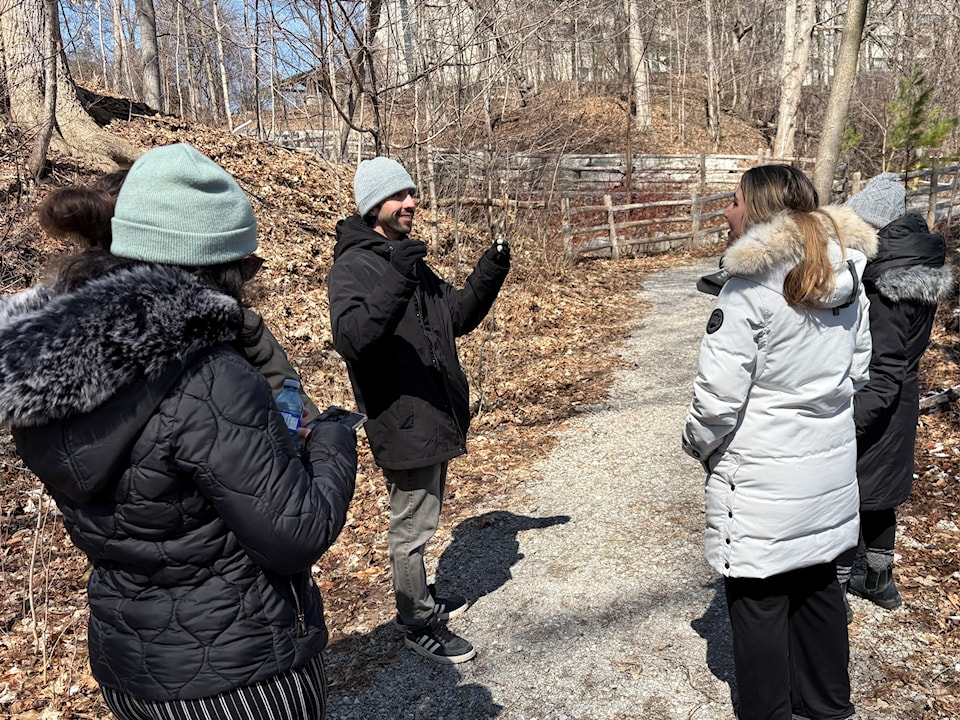 Nature interpreter Joaquín Varela speaks to attendees during the International Beaver Day walk.HumberETC/Allison Waytowich