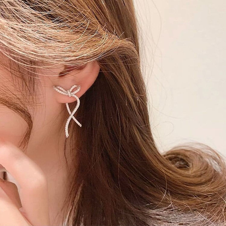 Thumbnail: Sparkly Bowknot Irregular Earrings, Bowknot Cross Earrings | A8208