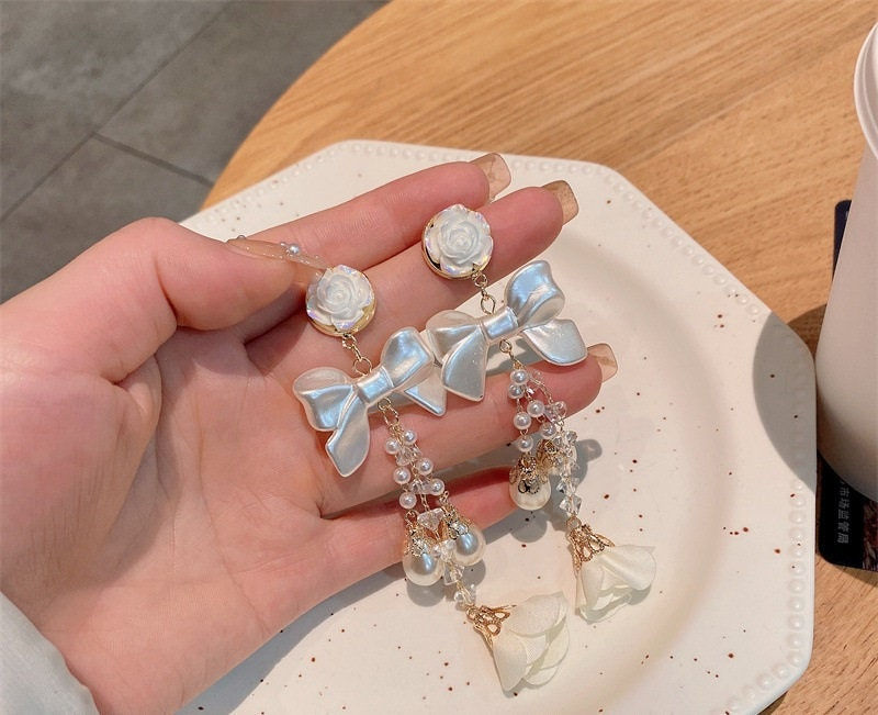 Thumbnail: Boho Nature Camellia Pearl Bow Chandelier Earrings | HE8942