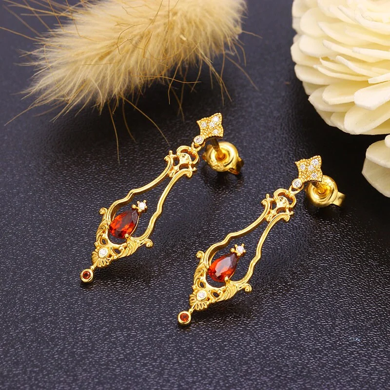 A Pair of antique red garnet gold earrings