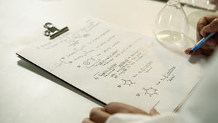 LearnFire IBDP Chemistry student in Berlin, Germany taking notes receiving online tutoring.