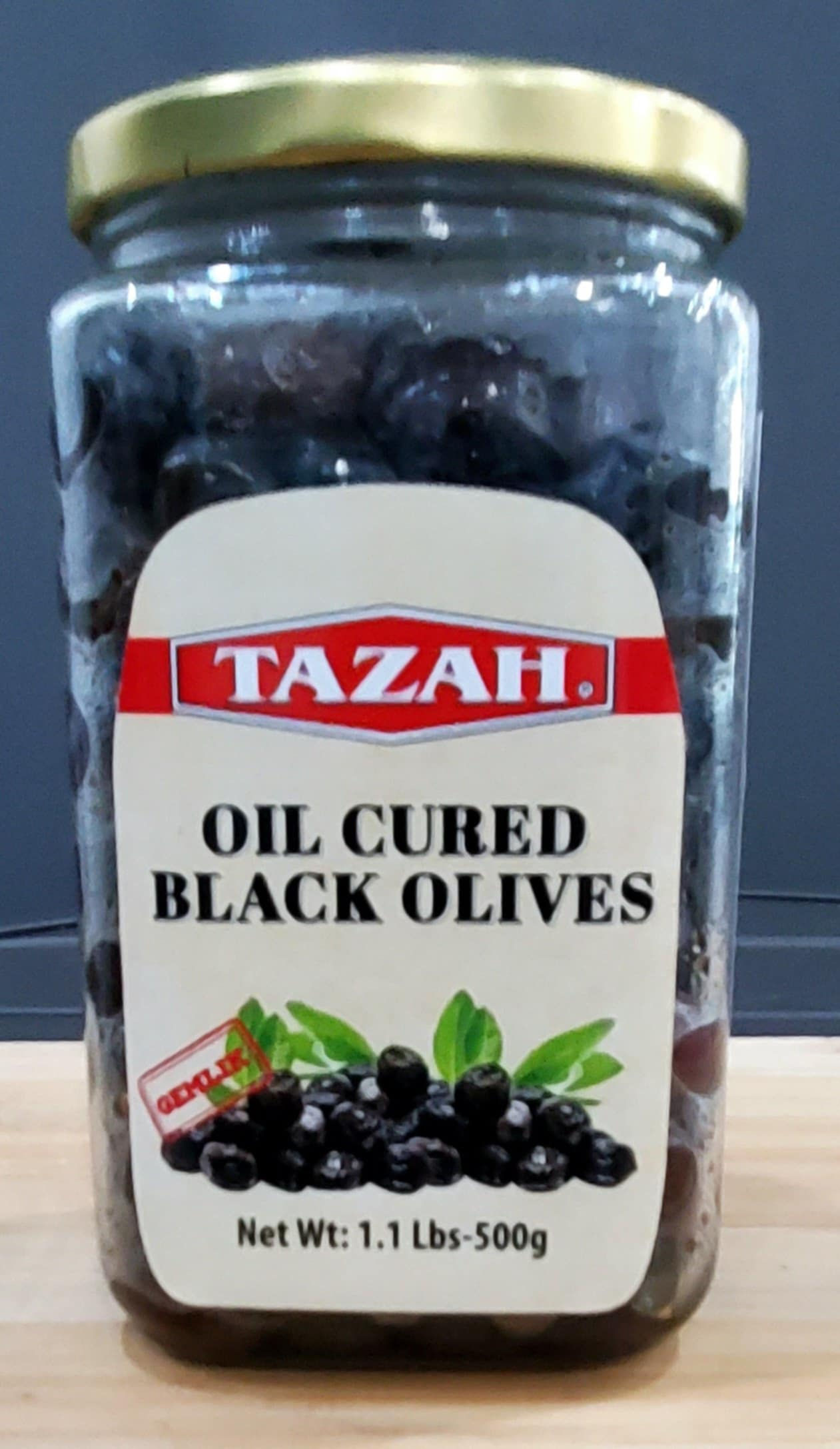 Aceituna Negra Curado en Aceite. 500G