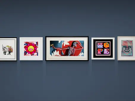 Collecting street art — framed Shepard Fairey, Ben Eine, Insane51, Murakami and Jeff Gillette on a gallery wall at D-Gallerie, St. Petersburg.