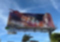 Static billboard with cutout attached to the top. Displaying Hail Mary advertisement