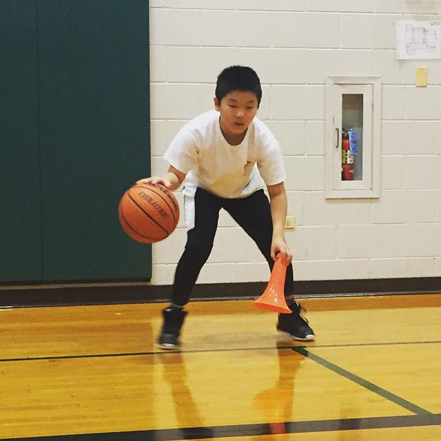 Tomaki doing cone drills to improve ball handling during Triple Threats Impact Training #traintriple