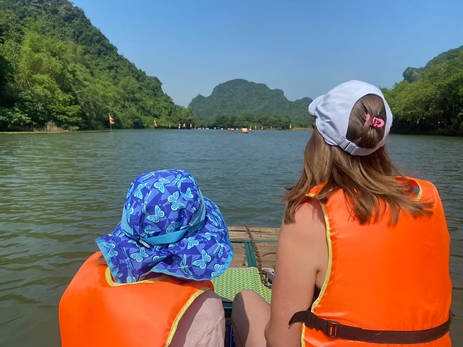 Setting off on the Tràng An boat tour past limestone karsts