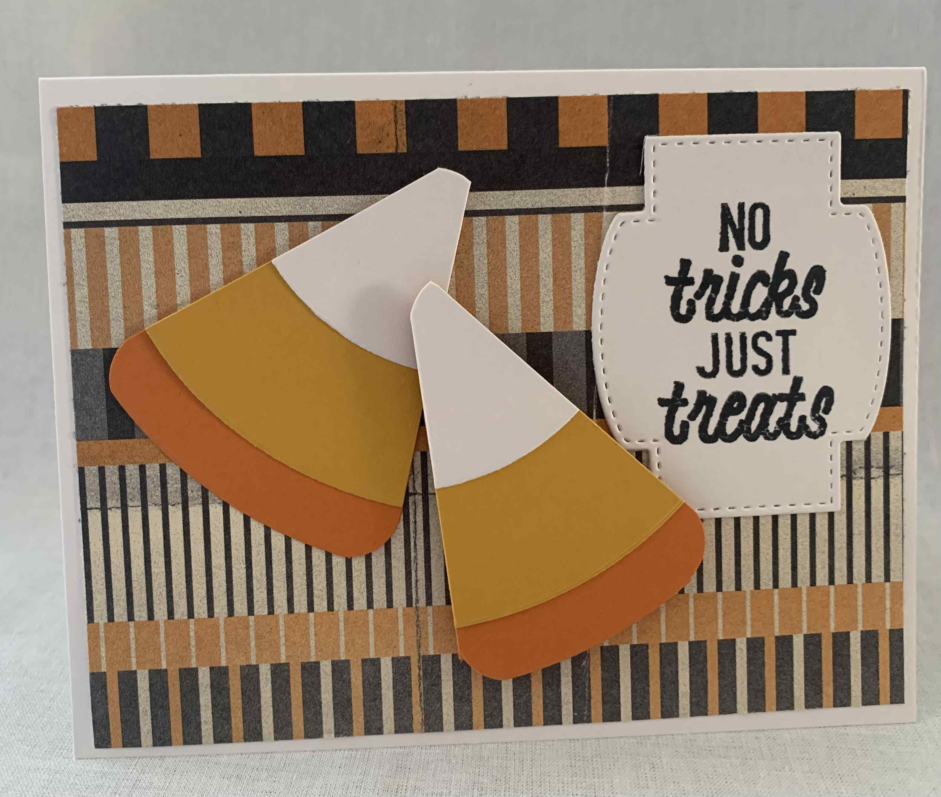 No Tricks Just Treats with Candy Corns with A Orange, Black and White Background