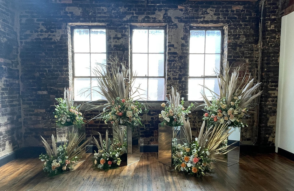 Custom floral wedding arbor and backdrop