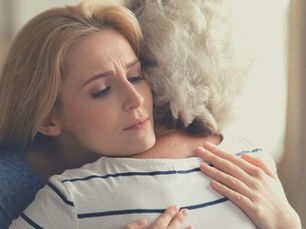 two women hugging - empathy