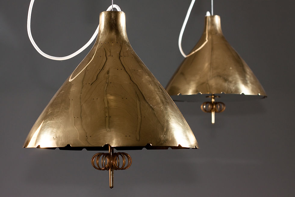 Paavo Tynell, pair of 1940's brass counterweight pendant lamps, Taito Oy