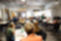 People participating in a virtual or in-person community development gathering