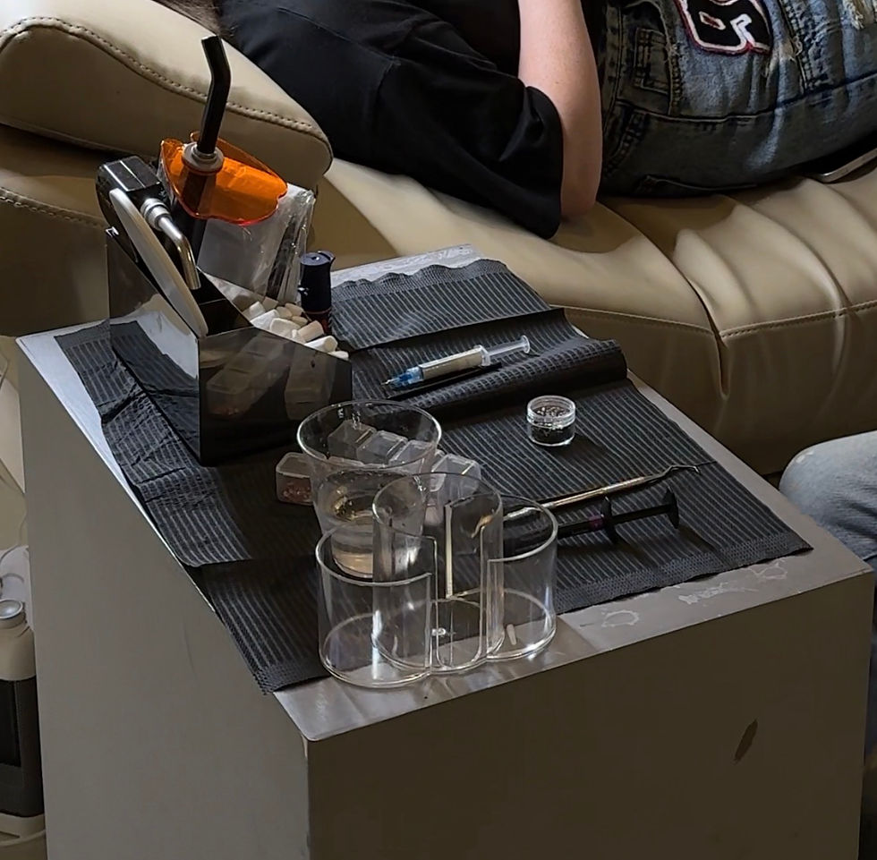 High angle view of dental tools and tooth gem application kit on a clean surface