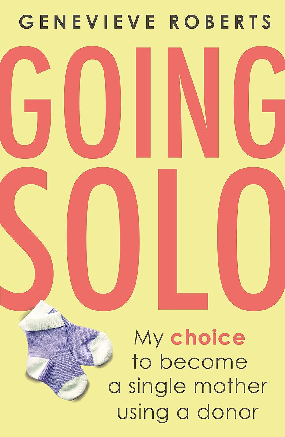 Going Solo book cover with yellow background with baby socks in grey and white