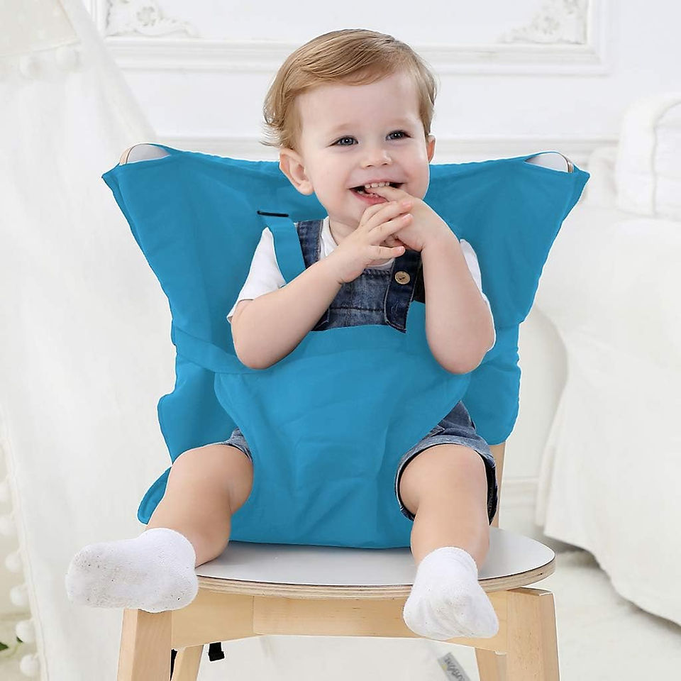 Child sitting in the blue Vine Travel High Chair on a chair