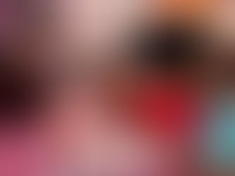 Staff member painting a young girl's face