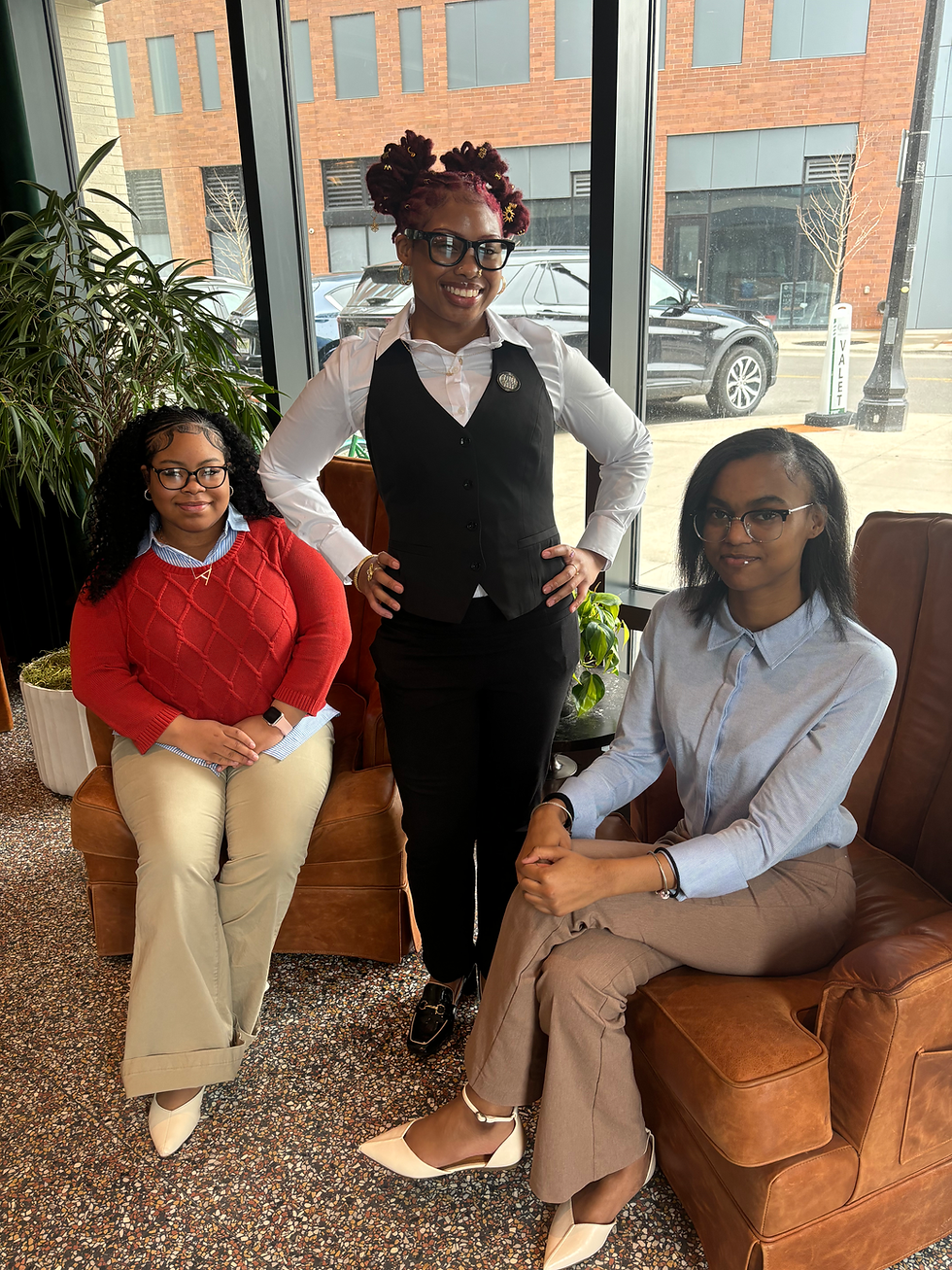 Amber, Perion, and Imani strike a pose at The Graduate in East Lansing