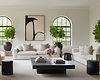 Modern country living with large ink painting, modern white sofa and large plants in symmetrical arrangment