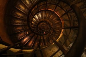 This spiral staircase represents the many different levels on which we might address a problem. What might not be happiness on one level becomes happiness on the next.