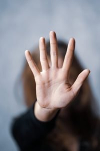 A womans palm towards you says no.NO!