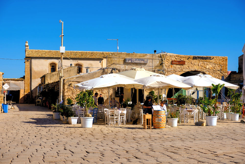 Restaurant by the sea in Marzamemi, Sicily