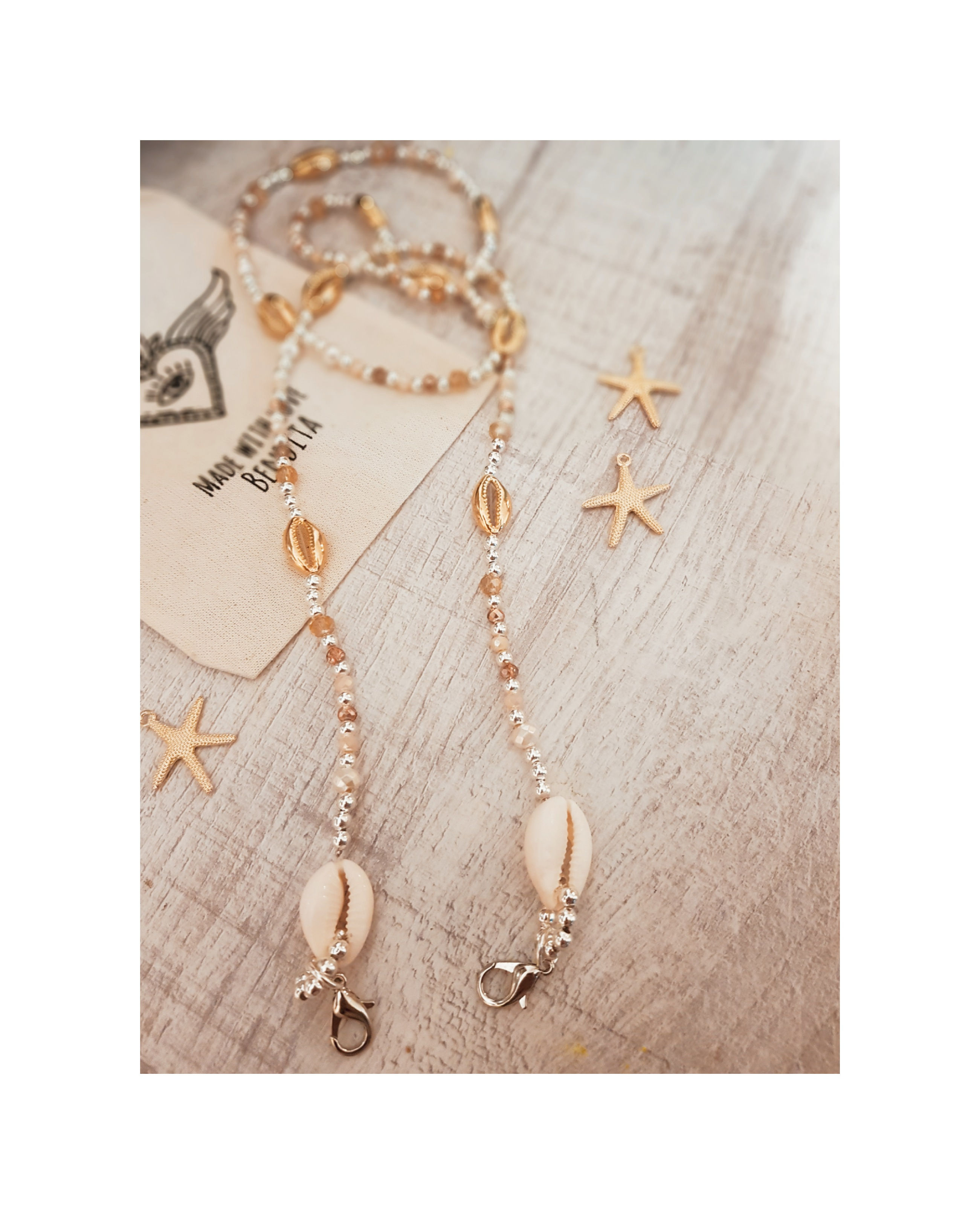 Cuelga lentes buzios 