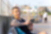 outside guy on bench with laptop.jpg