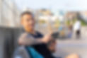 outside guy on bench with laptop.jpg