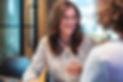 small smiling two women corporate.jpg