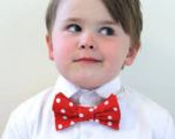 Adorable child with bow tie.