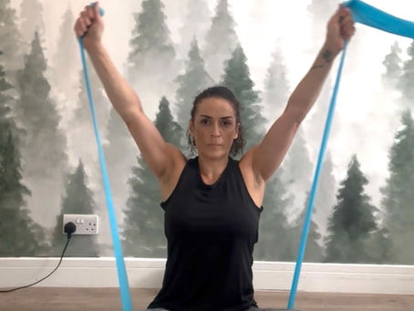 Pilates with resistance bands in Bushey