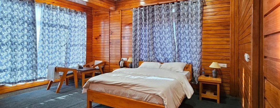 Luxury executive room at Khusimsim Mechuka homestay, ₹2700 per room with modern amenities