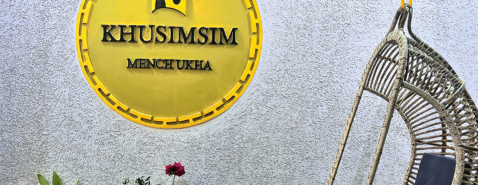 Khusimsim Mechuka homestay central building in Mechuka town with Himalayan backdrop