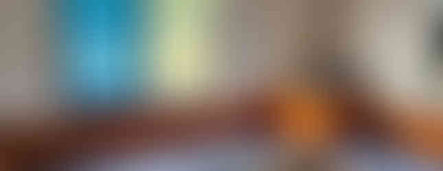 Warm fireplace and common seating area at Khusimsim Mechuka homestay for guest evenings