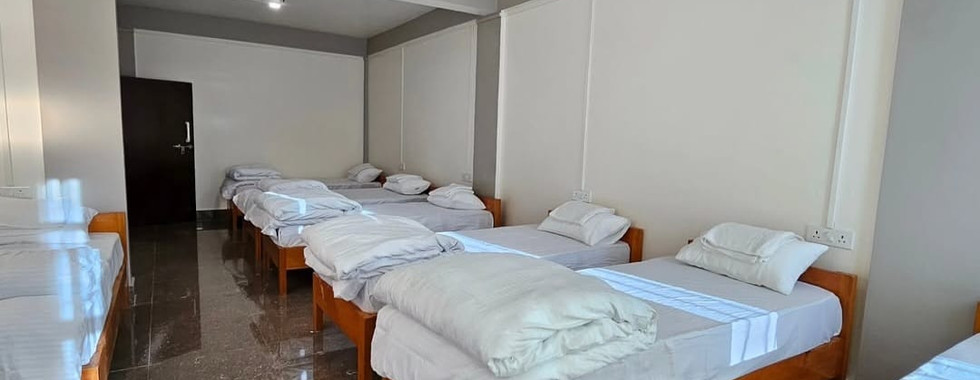 Khusimsim Mechuka homestay 7-bed dormitory room at ₹700 per person, budget group stay
