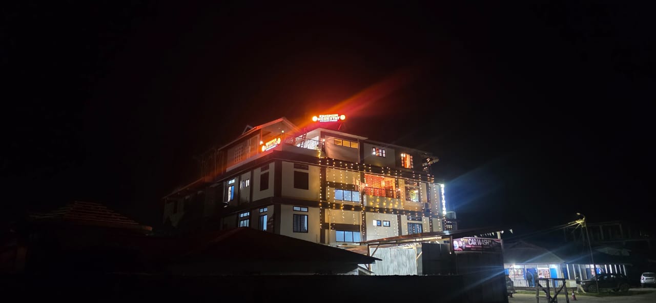 Khusimsim Mechuka homestay central building in Mechuka town with Himalayan backdrop