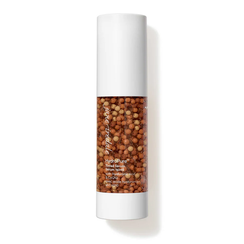 Clear bottle with make up serum inside.