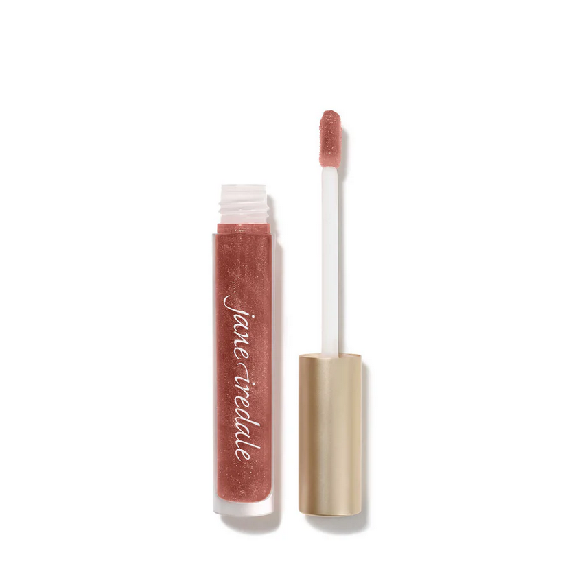 Clear make up tube with a doe foot applicator containing lip gloss.