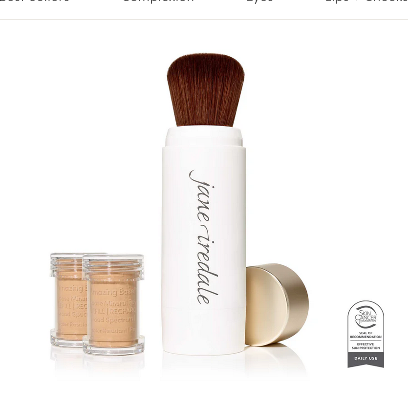 White make up bottle with a brush containing mineral powder.