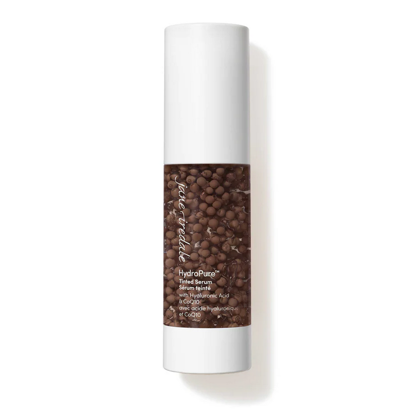 Clear bottle with make up serum inside.