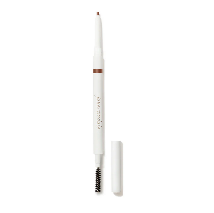 A thin make up contianer with an eye brow applicator.
