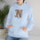 Thumbnail: Blue Unisex Gildan 18500 Hooded Sweatshirt Personalized with name in Illuminated Letters. Georgie & Lexy Gifts & Home USA.