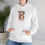 Thumbnail: White Unisex Gildan 18500 Hooded Sweatshirt Personalized with name in Illuminated Letters. Georgie & Lexy Gifts & Home USA.